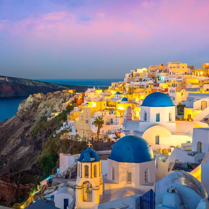 thira-town-santorini-island-twilight-greece-scaled
